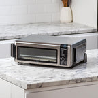 Foodi Four Multifonctions 8-en-1, Mini four portable, surfaces de travail, four multifonctions avec 8 fonctions de cuisson ; Air Fry, Rôtir, Griller, Cuire et plus encore. Argent/Noir SP101EU