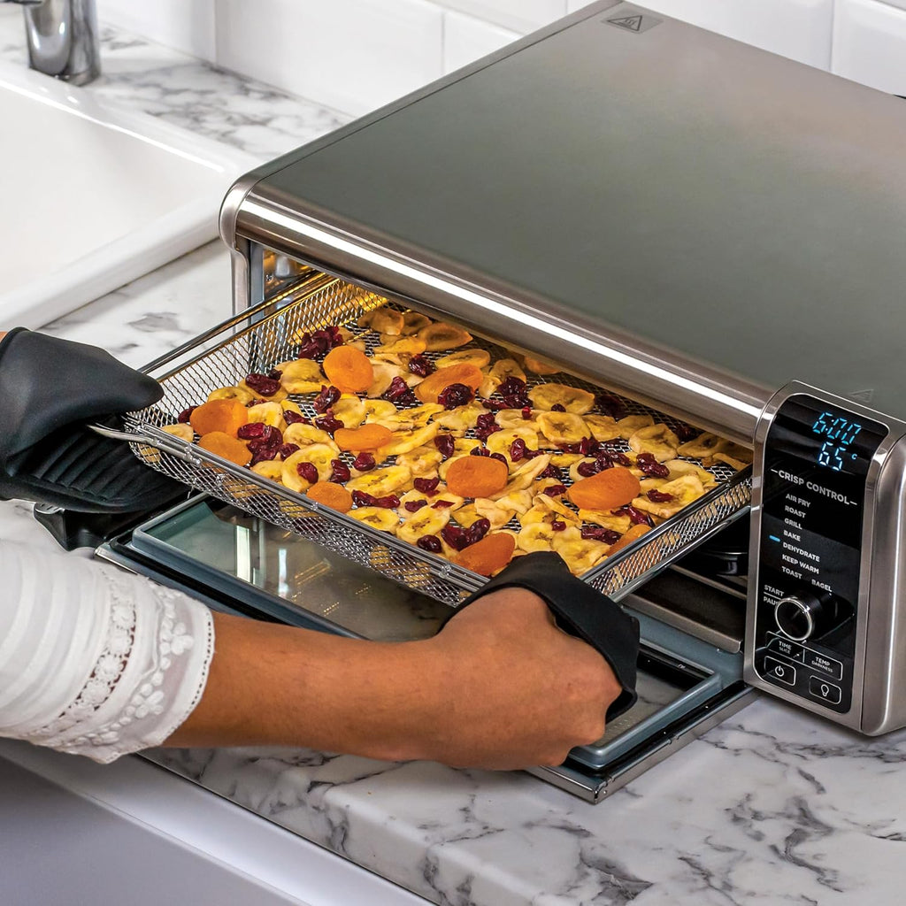 Foodi Four Multifonctions 8-en-1, Mini four portable, surfaces de travail, four multifonctions avec 8 fonctions de cuisson ; Air Fry, Rôtir, Griller, Cuire et plus encore. Argent/Noir SP101EU