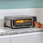 Foodi Four Multifonctions 8-en-1, Mini four portable, surfaces de travail, four multifonctions avec 8 fonctions de cuisson ; Air Fry, Rôtir, Griller, Cuire et plus encore. Argent/Noir SP101EU
