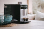 Melitta Purista - Kaffeevollautomat mit Lieblingskaffee-Funktion, Kaffeemaschine mit Mahlwerk und 3-stufig einstellbarer Kaffeestärke, für Kaffee und Espresso, schwarz