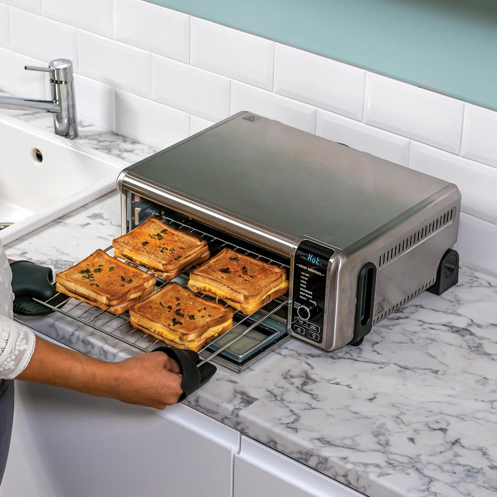 Foodi Four Multifonctions 8-en-1, Mini four portable, surfaces de travail, four multifonctions avec 8 fonctions de cuisson ; Air Fry, Rôtir, Griller, Cuire et plus encore. Argent/Noir SP101EU